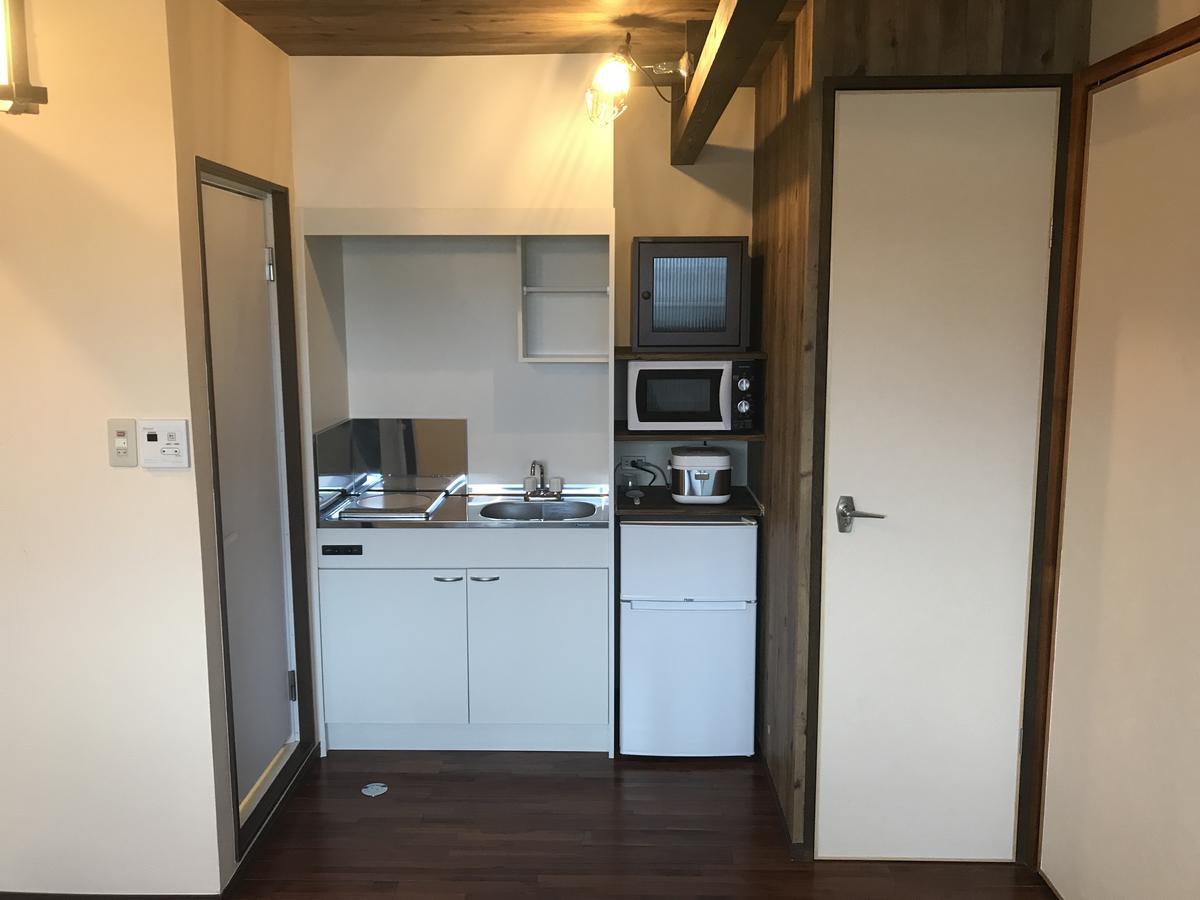 Urban Condominium Wafutei Наха Стая снимка